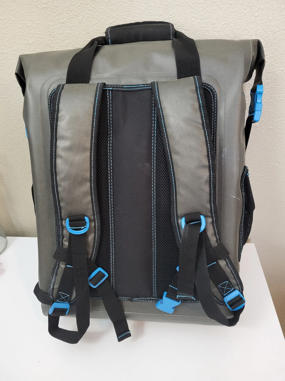 Magellan Outdoors Gray Waterproof Zip Top Backpack with Blue Accents